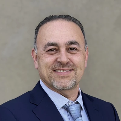 A headshot photo of Dr. Ghassan Aro